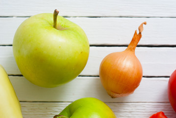 fruits and vegetables on white wood table