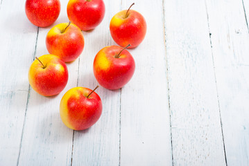 apple fruits on old white wooden table