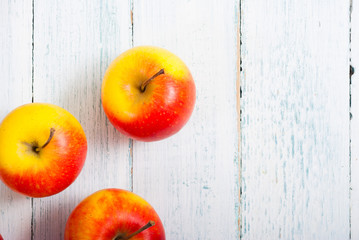 apple fruits on old white wooden table
