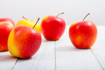 apple fruits on old white wooden table