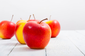 apple fruits on old white wooden table
