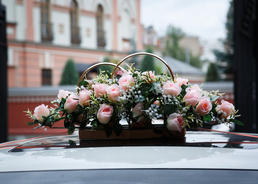 Beautiful dyeing flowers wedding car.
