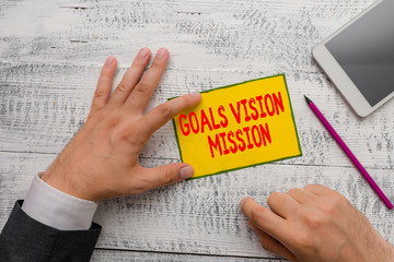 Handwriting text writing Goals Vision Mission. Conceptual photo practical planning process used to...