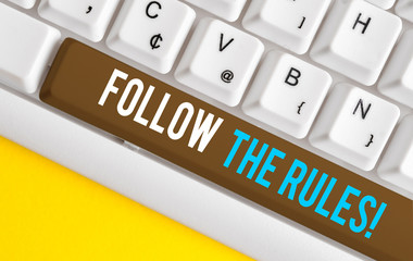 Handwriting text Follow The Rules. Conceptual photo go with regulations governing conduct or...