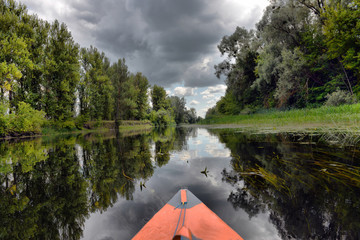 CCouple kayaking together in river.  Tourists kayakers touring the river of Ukraine.