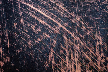 Metal covered with yellow patina with textured pattern. Blur, soft focus