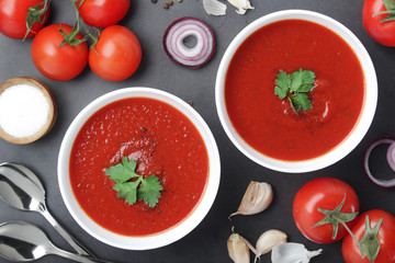 Two plates with gazpacho - traditional Spanish tomato soup	