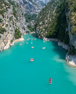 France, july 2019: St Croix Lake, Les Gorges du Verdon with Tourists in kayaks, boats and paddle boats., Provence