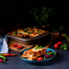 spicy lasagne with tomato sauce and basil