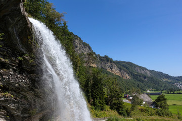 Obraz premium Steinsdalsfossen is a waterfall in the village of Steine, Hordaland county, Norway