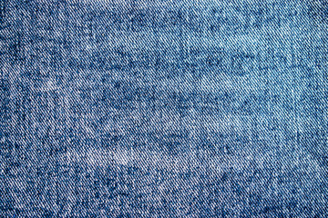 Fototapeta na wymiar Blue background Jeans, the fabric of the jeans, texture.