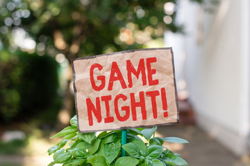 Writing note showing Game Night. Business concept for usually its called on adult play dates like...