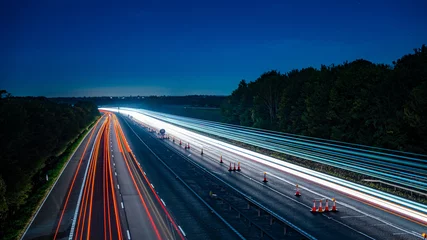 Peel and stick wall murals Highway at night Motorway fast traffic light trails at night
