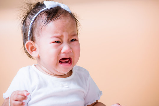 Asian child baby sad cry