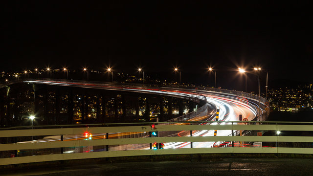 Night time light trails are pictured as traffic passes over Tromso bridge in northern Norway.