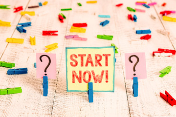 Handwriting text Start Now. Conceptual photo do not hesitate get working or doing stuff right away Scribbled and crumbling sheet with paper clips placed on the wooden table