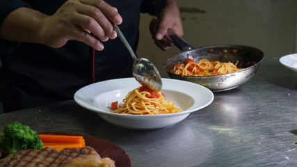 chef plating spaghetti