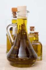 oil bottles grouped in white background, olive oil
