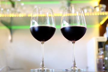 two glasses of red wine