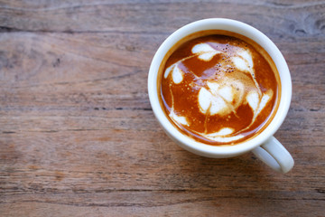 coffee cup on wood background and space