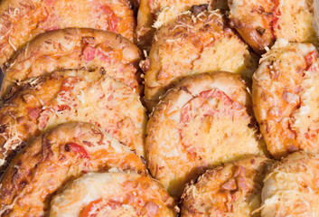 Yeast dough tortilla with cheese, ham, tomatoes, fast food. Oriental cuisine, close-up