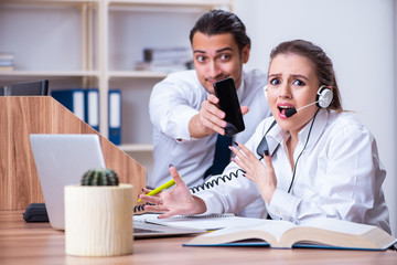 Call center operators working in the office