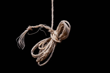 rope with knot on black background