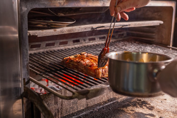 Fototapeta premium Food concept - Steak is coated with sauce