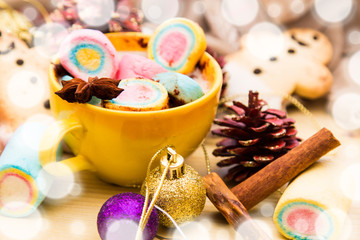 Christmas greeting with cup of hot chocolate with marshmallows and Christmas cookies