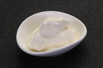 Sour cream in the bowl