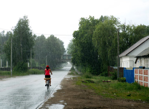 Biker in the heavy rain