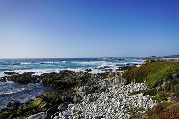 Beautiful coastline scenery with ocean waves and rocks on Pacific Coast, California, US