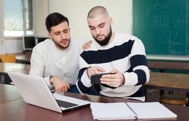 University students using mobile phone