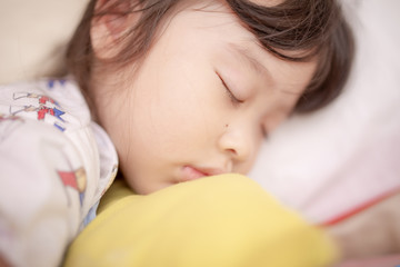 asian little girl sleeping