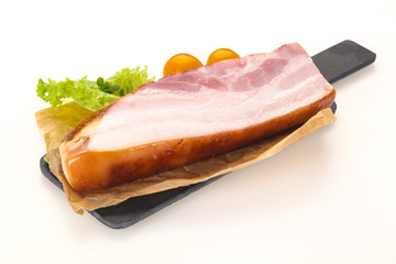 Smoked pork breast with salad leaves