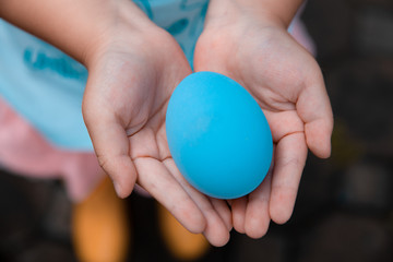 Easter egg in girl's hand