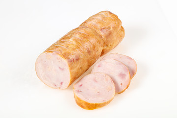 Tasty meat sausages over white background