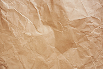 Crumpled kraft paper surface, abstract background