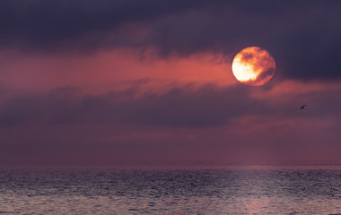 Sunrise over the sea and beautiful cloudscape. Meditation ocean and sky background. 