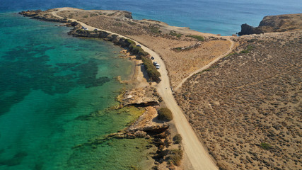 Aerial drone photo of emerald secluded crystal clear sea rocky cove of Ble limanaki or Blue Harbour in famous island of Astypalaia, Dodecanese, Greece