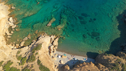 Aerial drone photo of emerald crystal clear sea rocky beach of Plakes in famous island of Astypalaia, Dodecanese, Greece
