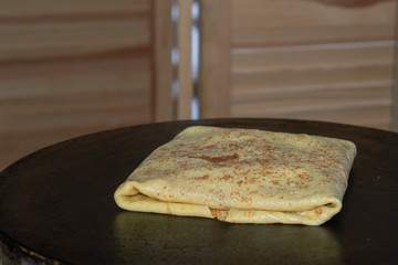 Freshly cooked pancake with cheese filling