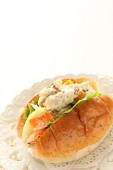 Chicken and potato mayonnaise salad in bun sandwich
