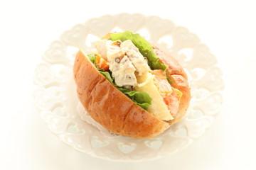 Chicken and potato mayonnaise salad in bun sandwich