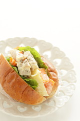 Chicken and potato mayonnaise salad in bun sandwich