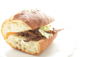 Homemade grilled beef and vegetable in French bread sandwich