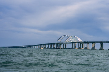 Obraz premium Crimean bridge over the sea of Azov view from the boat summer