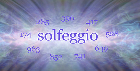 The Nine Solfeggio Frequencies background - blue energy sound waves background concept with the word SOLFEGGIO in the centre and the nine frequencies equidistant around 