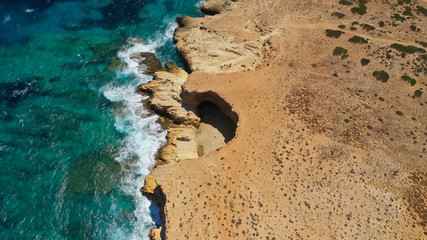 Aerial drone photo of volcanic formations of Gala rocky seascape in Pano Koufonisi island, Small Cyclades, Greece