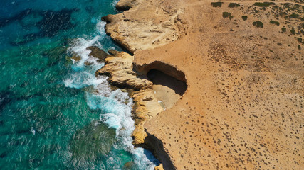 Aerial drone photo of volcanic formations of Gala rocky seascape in Pano Koufonisi island, Small Cyclades, Greece